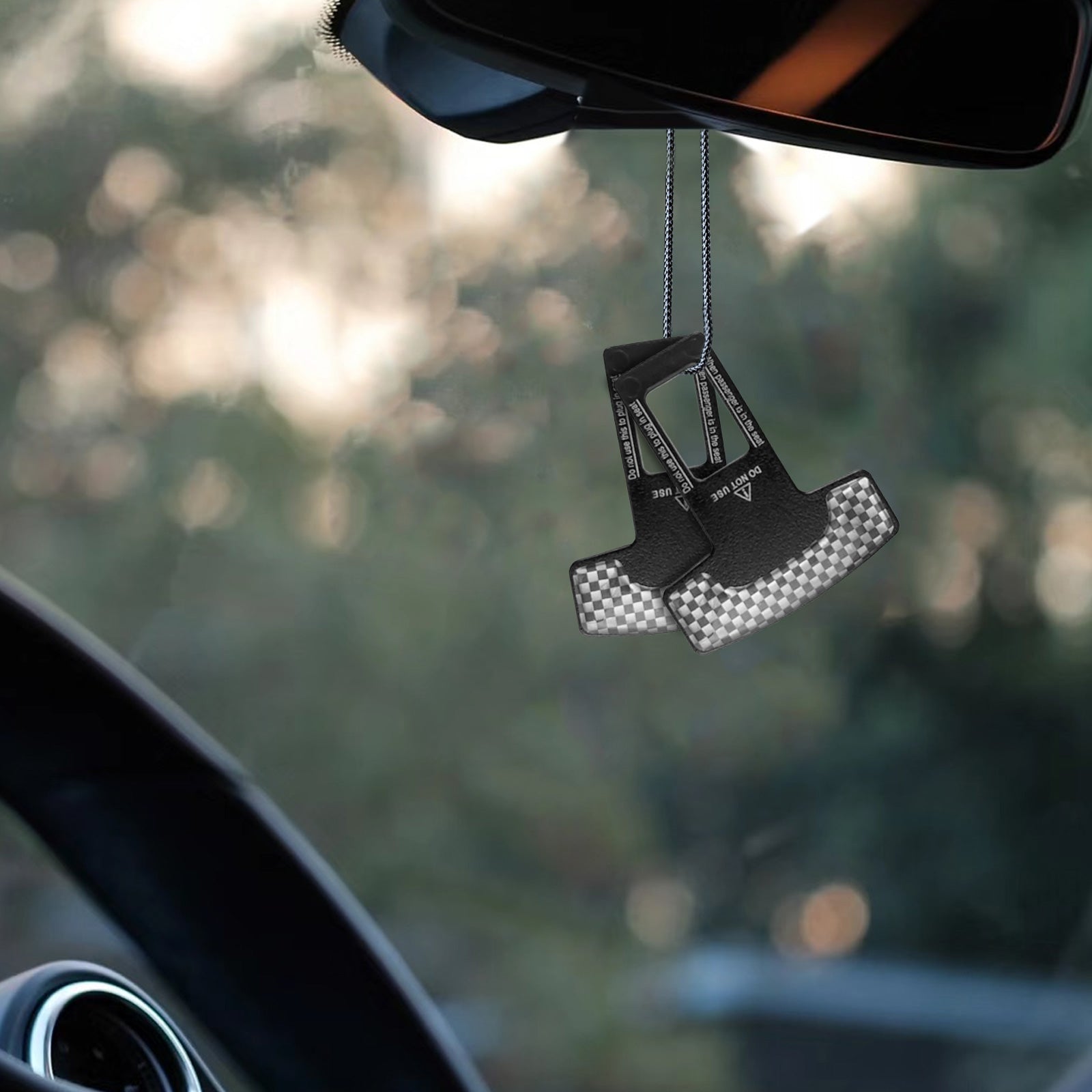 universal seat belt clip pad trim accessory in Black grid for car interiors - installation detail